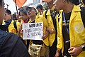 University of Indonesia student holds a sign that reads, 'Info Loker for Gibran & Kaesang,' referencing the ease with which the two secured their positions.