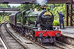 GWR 6959 Class 7903 Foremarke Hall wearing a 40th anniversary placard, is ready to take the Gloucestershire Warwickshire Railway train out of Toddington station in July 2021