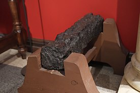 Pig iron ballast from Captain James Cook's HM Bark Endeavour in the New Zealand Maritime Museum. This piece of ballast was recovered from the Great Barrier Reef in Australia, where Endeavour had gone aground in 1770.