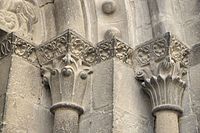 Typically intricate carved capitals and mouldings