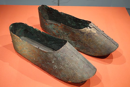 Bronze shoes with hexagonal pattern
