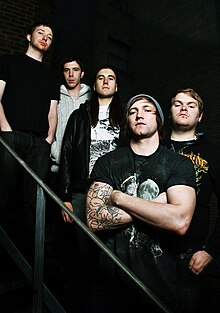 A press shot of the members of The Divided