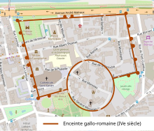 Tracé d'une enceinte de ville reportée sur un plan.