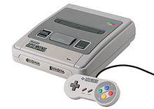 A Super Nintendo Entertainment System (a white video game console with two purple buttons for "Power" and "Reset" and a grey one for "Eject") and its controller (a gampad with a D-pad on the left, "Start" and "Select" buttons in the middle, four buttons on the right, and two shoulder buttons on top).
