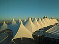 Modern tent roofs at the Denver International Airport using suspended structural membranes.
