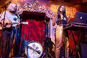 Flora Cash performing in 2018
