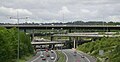 Image 19The multi-level junction between the M23 and M25 motorways near Merstham in Surrey. The M23 passes over the M25 with bridges carrying interchange slip roads for the two motorways in between.