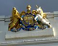 The British coat of arms on the façade