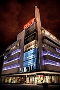 The Sundt building at night in 2011