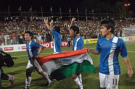 The captain of Indian Football team, Bhaichung Bhutia celebrating along with other players after winning the final
