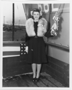 Miss Louise Leahy poses with the christening bottle