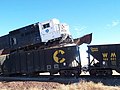 Aftermath of a test at the TTC in which a locomotive intentionally hit a hopper car