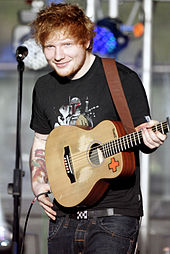 Singer Ed Sheeran performing
