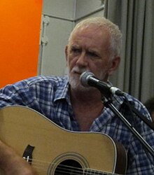 Davis live on stage with The Quarrymen in 2011.