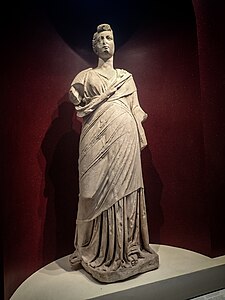 Statue of a woman with hairstyle dating to the later Roman Republican or Augustan period but body dating to 200–100 BCE