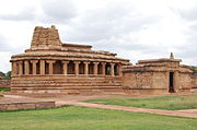 8th century Durga temple exterior view at Aihole complex. It includes Hindu, Buddhist and Jain temples and monuments.
