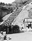 Prisoners of Mauthausen concentration camp in the quarry ("Stairs of Death"). DEST used them to produce building materials for the Führer Headquarters and other projects.