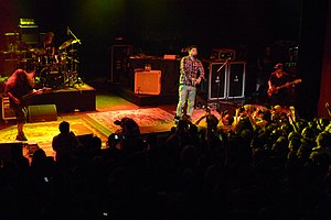 Deftones performing at the Shepherd's Bush Empire in 2011; from left to right: Carpenter, Cunningham, Moreno, and Vega
