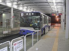 Bus with a driver on a guideway