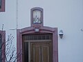 Niche avec statuette de la Vierge, maison à Schopp à Danne-et-Quatre-Vents, Lorraine.