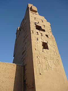 Large stone watchtower with inscriptions