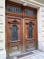 Double-hinged front door