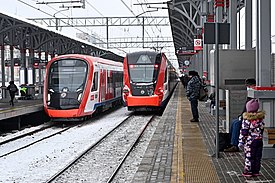 Ivolga 1.0 train (on the right) and current generation Ivolga 2.0 at Podolsk railway station of Line D2