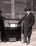 Edwin S. Votey (right) with the player piano