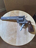 H&R Model 603 in 22 WMR. Made between 1980 and 1983.]]H&R model 603 (.22 WMRF six-shot pull pin revolver, Blued, Slab side barrel)