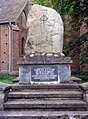 stone in front of the church