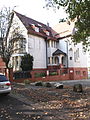 Wohnhaus mit Einfriedung, Garten und Nebengebäude