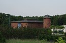 Wasserwerk Mittenwalde, bestehend aus Behälterhaus, Rieselturm und Maschinenhaus mit Trafostation