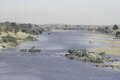 La rivière Falémé avec des buissons sur ses rives à la frontière Mali-Sénégal, 1984.