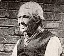 Newsprint image of old man with white hair