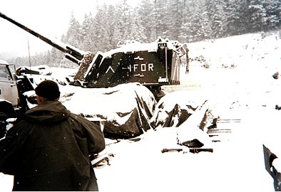French AuF1 howitzer of the 32nd Artillery Regiment with IFOR markings being serviced near the installations of the 1984 Winter Olympics at Sarajevo