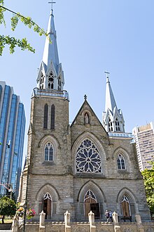 A French Gothic revival cathedral with two spires of unequal height