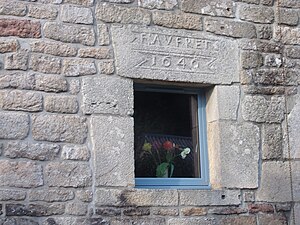 Détail du linteau de fenêtre portant l'inscription F AVFRET 1646.