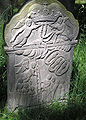 Gravestone from 1761 for a clergyman's wife at the historic graveyard, with Jacob's ladder and depictions of her 12 children.