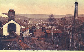 Close-up view of the extraction building, with the town of Ronchamp in the background.