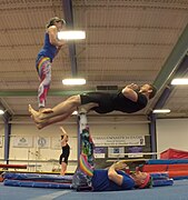 Three person balancing pose