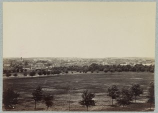 View looking north of the National Mall with the Treasury Building in the background in April 1865.