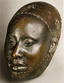 Mask for Obalufon II; circa 1300 AD; copper; height: 29.2 cm; discovered at Ife; Ife Museum of Antiquities (Ife, Nigeria)[48]