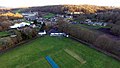 Armitage Bridge Cricket Club in the foreground. Village and Brooke's Mill behind.