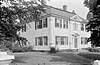 Black and white Historic American Buildings Survey photo from 1940 of white mansion amidst trees