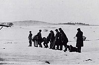 A White firing squad executes Red prisoners (photo taken by Harald Netvig).