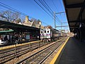 A Center City-bound train on the Lansdale/Doylestown Line stops at Jenkintown–Wyncote station in November 2017