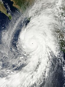 Satellite image of an extremely intense Hurricane Patricia on September 23, sporting a pinhole eye and a symmetric central dense overcast