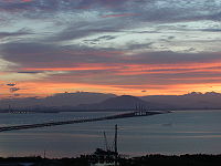 The 13.5 kilometre-long Penang Bridge traverses the South Channel between Gelugor on Penang Island and Perai in the mainland.