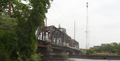 The Baltimore and Ohio Railroad Bridge, built in the late 19th or early 20th century as a two track, swing bridge across the Schuylkill River in the Grays Ferry neighborhood in Philadelphia, Pennsylvania. Now a CSX Philadelphia Subdivision bridge. View from the west river bank, looking northeast.