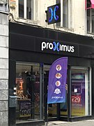 Proximus shop in Brussels (Belgium), showing a logo displaying the letter “x” by a looped-square-like shape